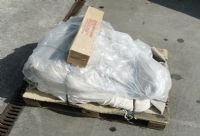 15hp outboard motor going to Greece. Wrapped by ourselves. Note the small empty box placed on top to avoid stacking.